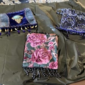 three velvet and beaded bags